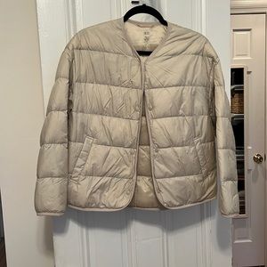 Uniqlo Women’s ultra light down beige short jacket. Never worn.
